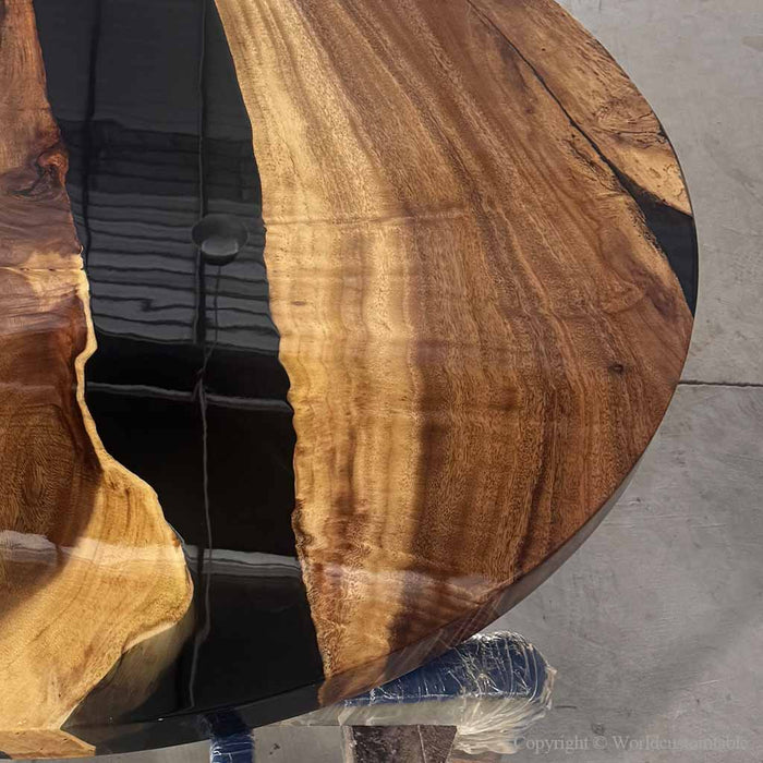 Handcrafted walnut wood table with smooth black resin finish