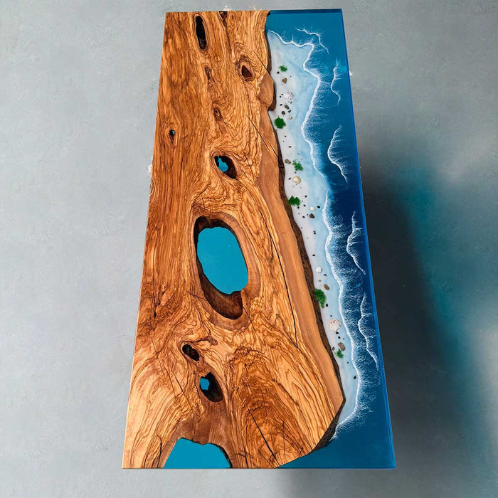 Handcrafted live edge walnut table featuring ocean resin inlay