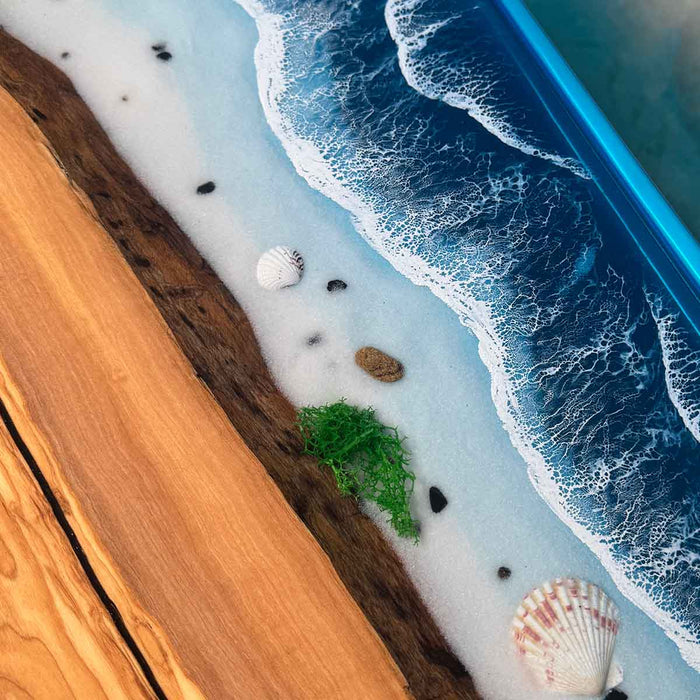 Handcrafted live edge walnut table featuring ocean resin inlay