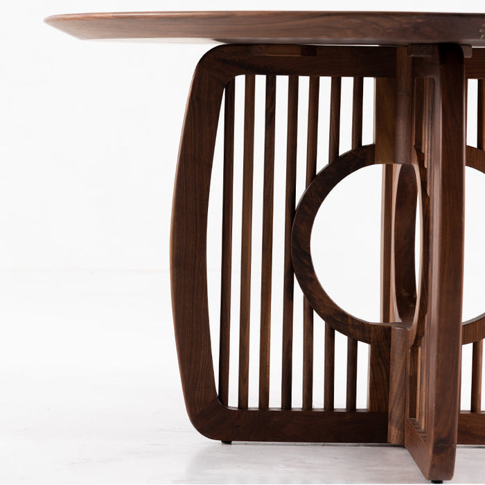 Handcrafted walnut round table with detailed natural wood grain