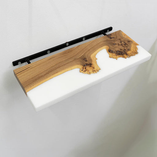 Wooden shelf with black metal bracket on a white background