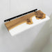 Wooden shelf with black metal bracket on a white background