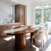 Artisan crafting a handmade black walnut epoxy dining table in a workshop in the USA