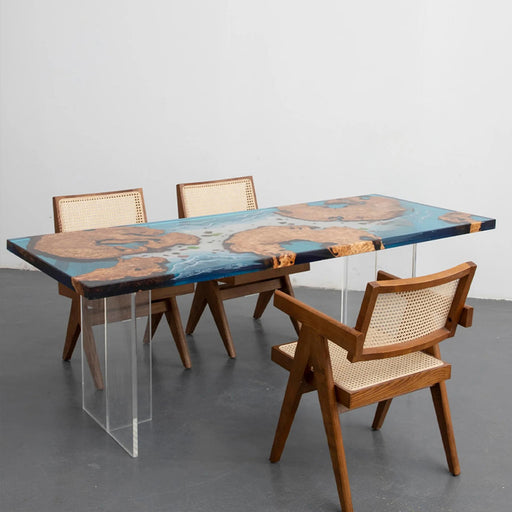 Close-up detail of live edge burl wood and ocean-style resin on luxury table