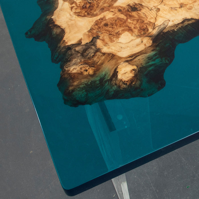 Artistic epoxy resin table with burl wood slab and turquoise resin