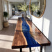 Handmade epoxy console table featuring a blue resin river