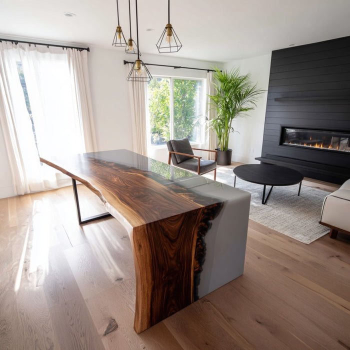 Modern living room with a wooden dining table, gray sofa, and black fireplace.
