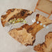 Custom clear resin coffee table mimicking frozen ice and natural wood.