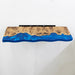 Handmade epoxy river wall shelf with live edge wood, perfect for modern storage and display