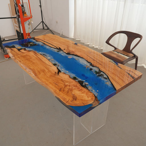 Handmade olive wood epoxy table perfect for beach house or coastal living spaces