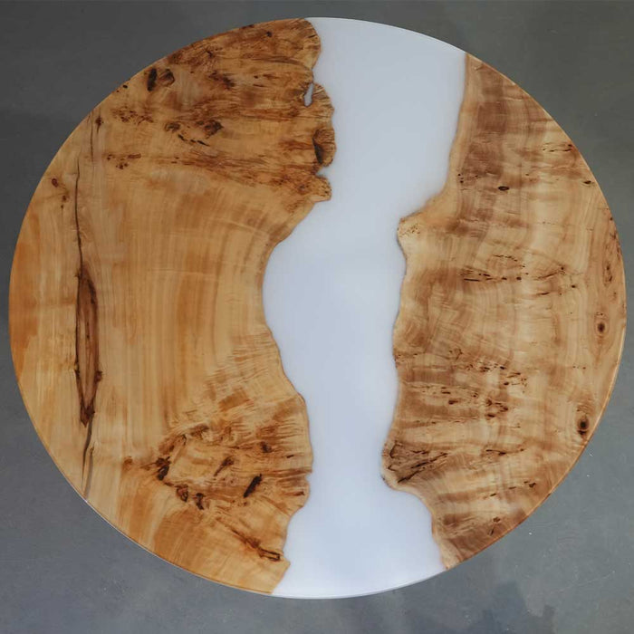 Handcrafted poplar wood table with natural grain and white resin flow.