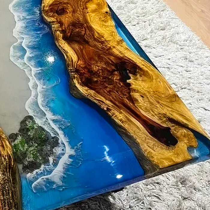 Wooden surface with blue resin and beach scene design on a textured surface