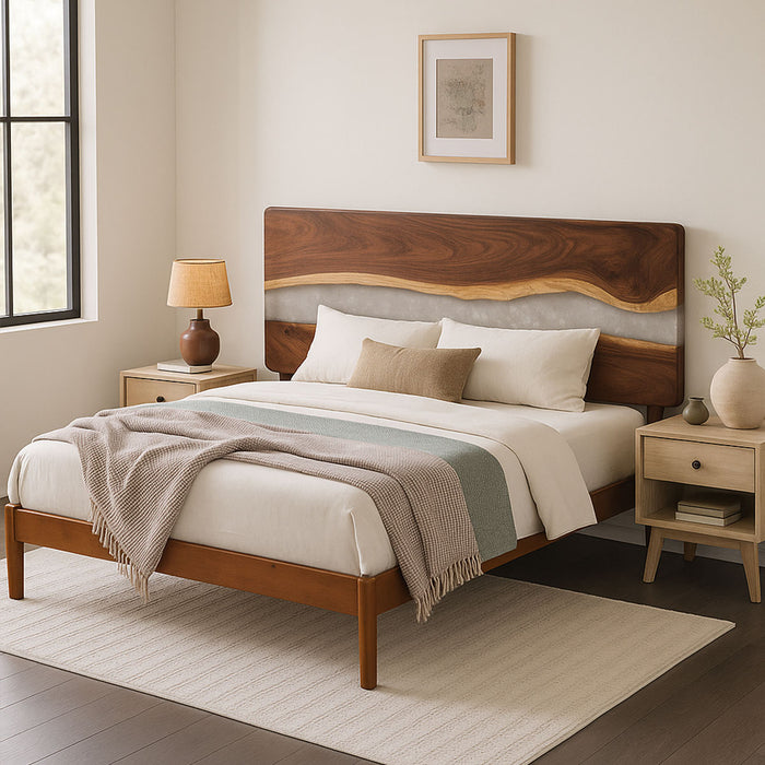 Wooden bed with bedding and side tables in a bedroom setting