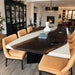 Handmade white epoxy dining table featuring a durable resin top and natural wood base.
