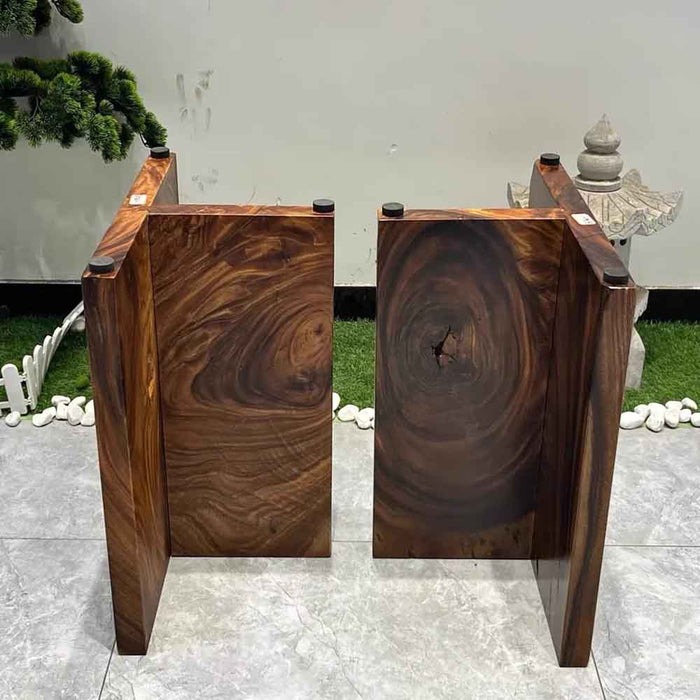 Two wooden planters with a natural wood grain pattern on a tiled floor.