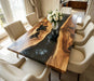 Heirloom-quality live edge black walnut dining table with iridescent black epoxy river, one-of-a-kind modern statement piece
