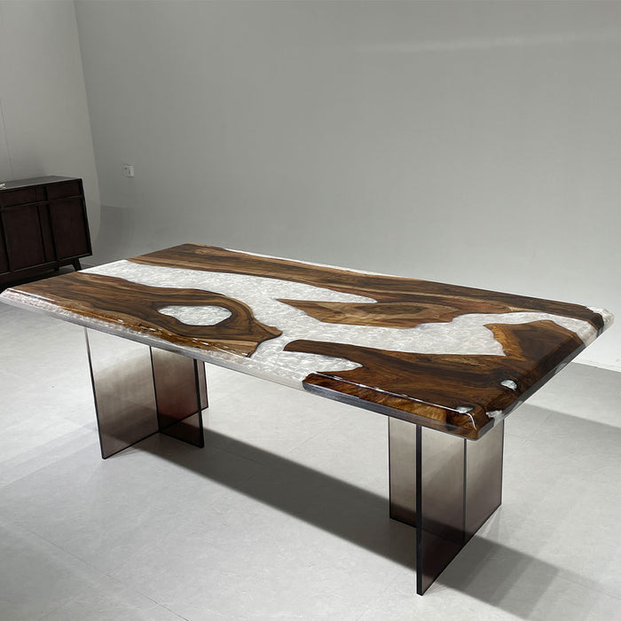 High-end black walnut table with elegant white swirl epoxy resin for Los Angeles dining spaces.