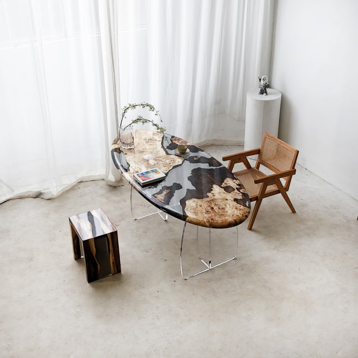 Resin and natural wood oval table for home décor showroom display