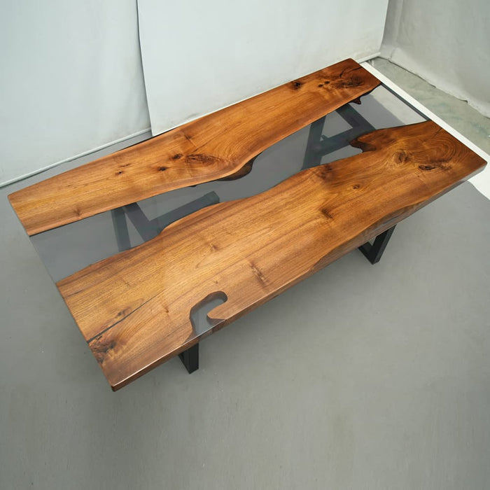 Black walnut dining table with crystal clear epoxy resin