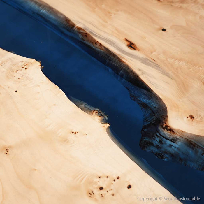 In-stock epoxy dining table featuring Poplar wood and translucent blue resin