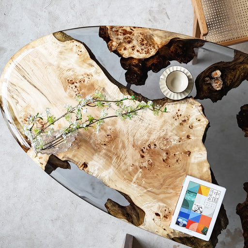 Artistic resin and burl wood table for interior design studios