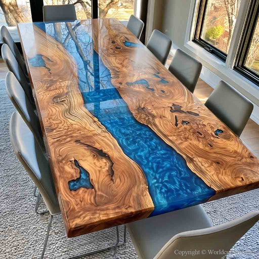 Luxury dining table featuring solid black walnut slabs with a flowing blue epoxy river centerpiece.