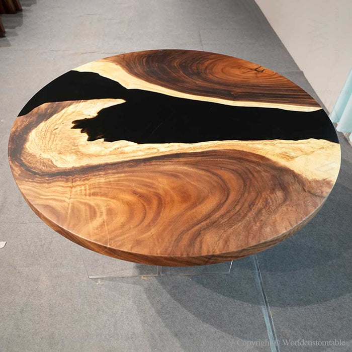Round live edge epoxy coffee table crafted from walnut wood for luxury interiors