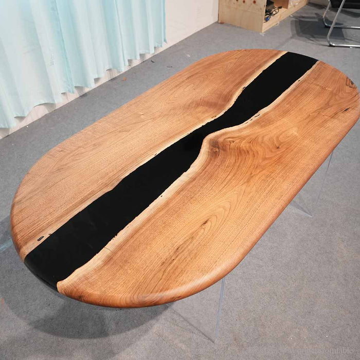Black walnut epoxy river table with elegant black resin finish