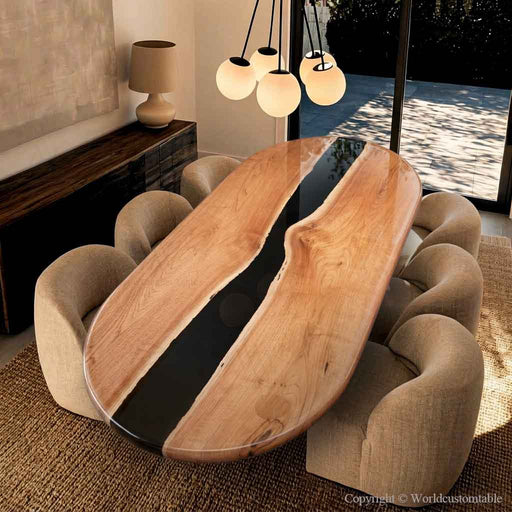 Oval black walnut epoxy dining table with black resin river design