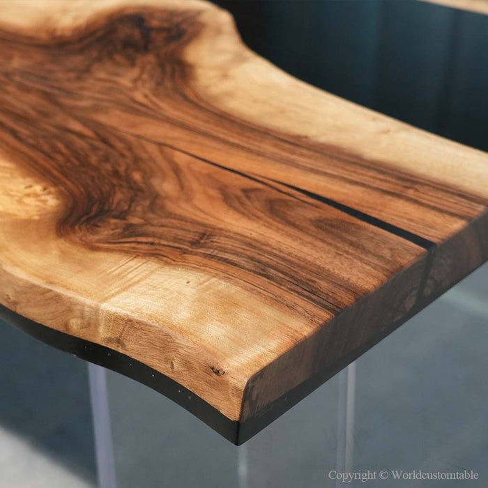 Handcrafted black walnut wood table with unique natural live edge surface