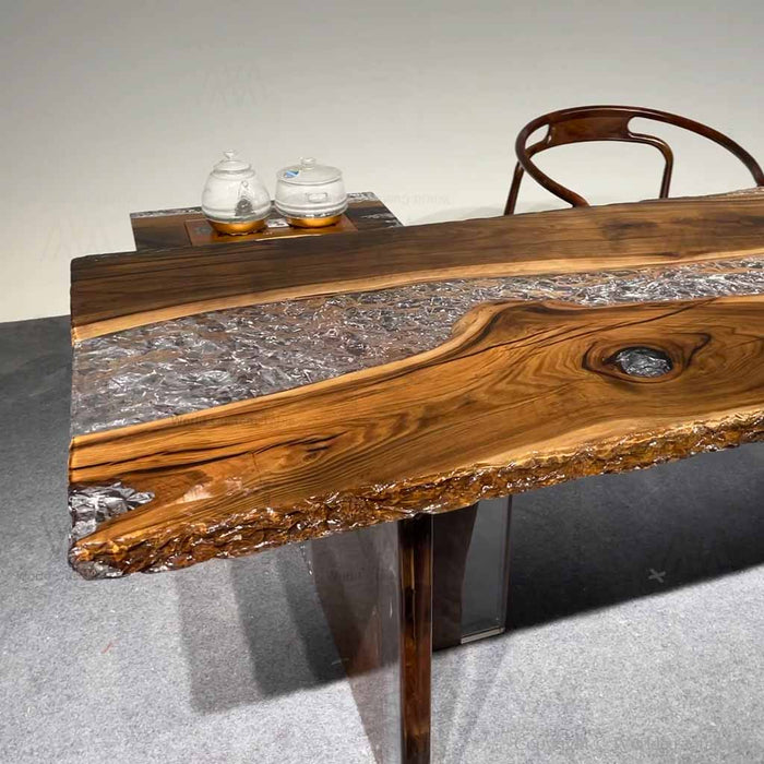 Artisan crafted walnut slab resin table featuring unique knots, natural edges, and one-of-a-kind character.