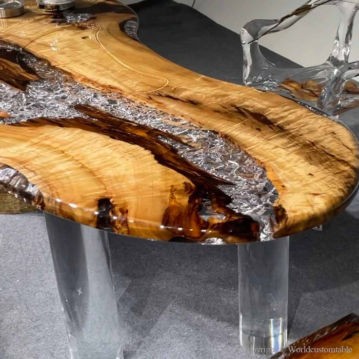 Artisan crafted golden camphor slab table with one-of-a-kind grain patterns and handcrafted resin details.