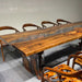 High-gloss epoxy surface creates a glass-like effect while enhancing the beauty of the walnut wood.