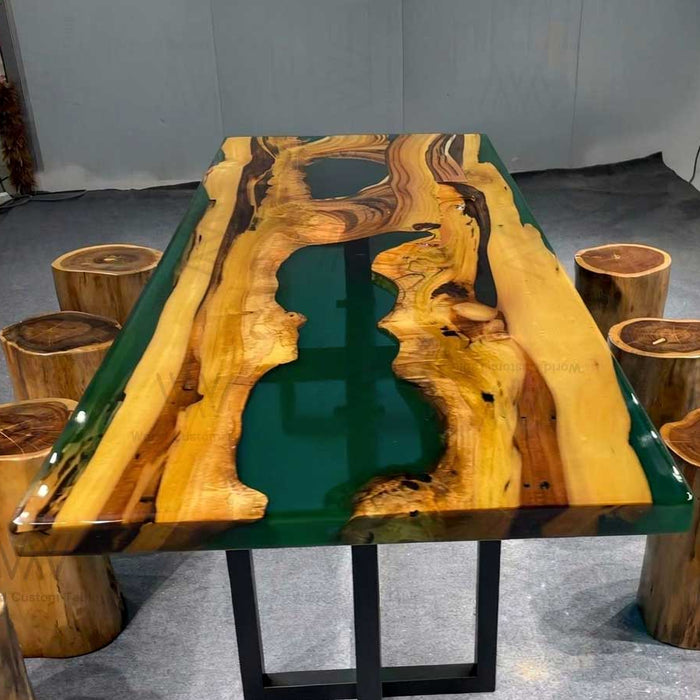 Handcrafted resin river table made with premium golden camphor wood and vibrant green epoxy resin.