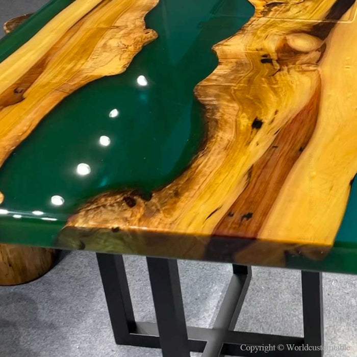 Live edge golden camphor epoxy dining table showcasing organic edges, knots, and unique hardwood character.
