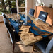 Live edge poplar dining table featuring handcrafted blue epoxy resin details