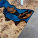 Modern farmhouse dining table made with poplar wood and ocean blue resin