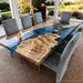Custom poplar wood epoxy dining table with blue resin river for modern dining room
