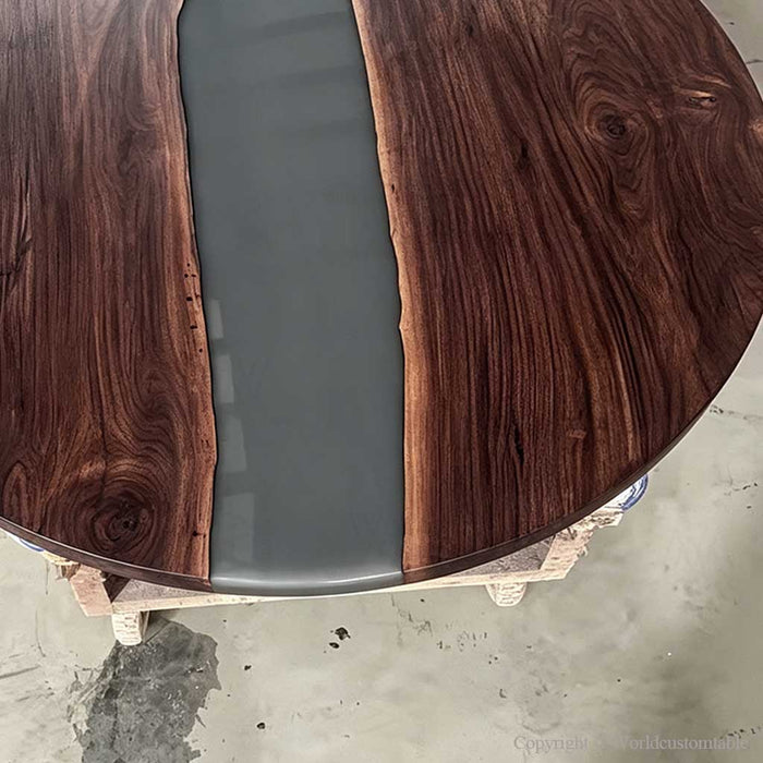 Smoke gray epoxy river table crafted for custom home furniture