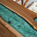 Black walnut epoxy counter designed for a stylish home bar