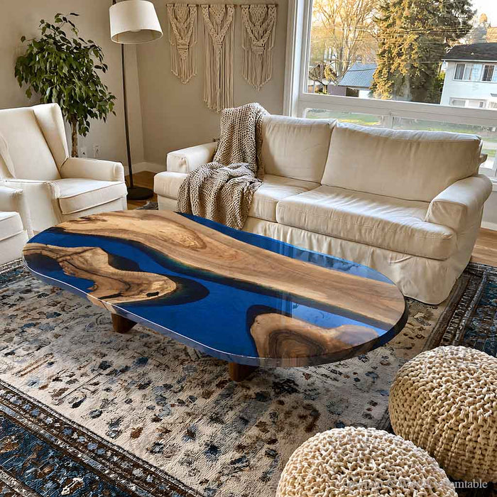Black walnut epoxy coffee table with deep blue resin and boat shaped design