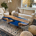 Black walnut epoxy coffee table with deep blue resin and boat shaped design