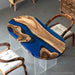 Blue resin black walnut coffee table for a modern living room