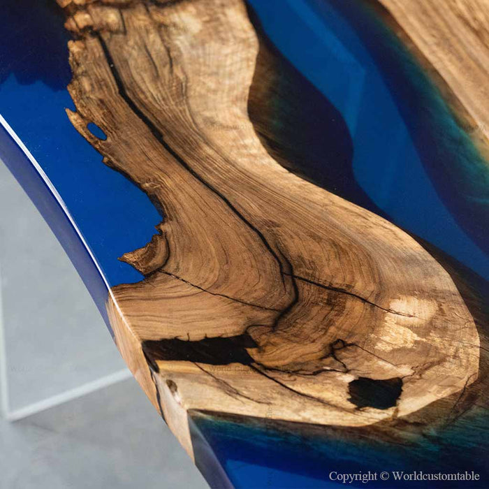 Modern blue epoxy walnut coffee table with sculptural boat shaped top