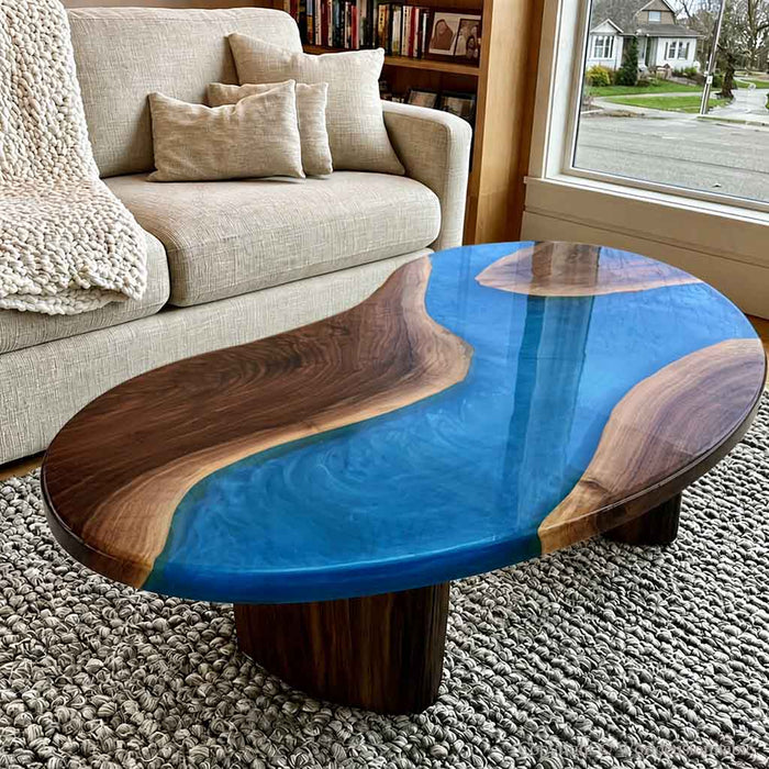 Walnut epoxy coffee table with blue resin and a unique Ocean Drop design