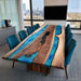 Black walnut epoxy meeting table with peacock blue resin