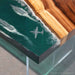 Unique walnut epoxy dining table inspired by the open sea