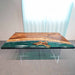 Nautical walnut resin dining table with embedded ship