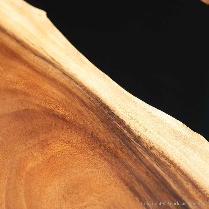 Custom black resin waterfall desk handcrafted from walnut wood