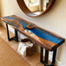 Blue resin black walnut console table for a modern entryway